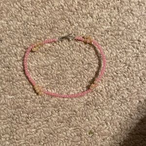 pink anklet with gold beads